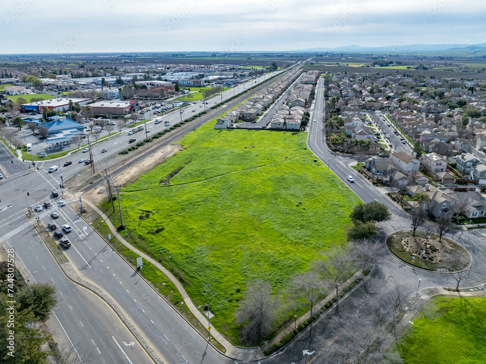 Drone photos over vacant land in a community in a community in northern California. Green space vacant land. Commercial Real Estate