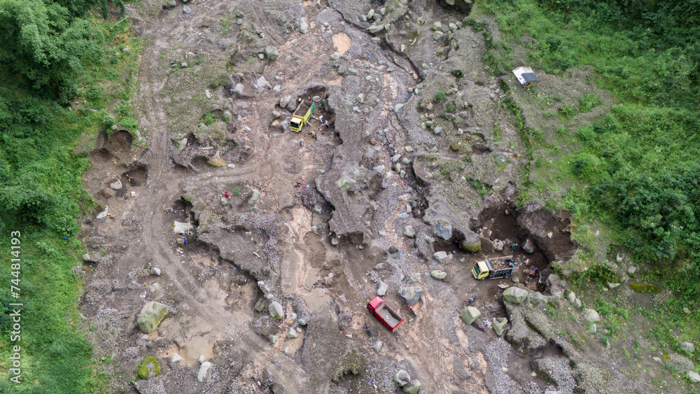 aerial view of sand and stone mining on the slopes of Mount Merapi in Sleman Regency, Yogyakarta aerial view of sand and stone mining on the slopes of Mount Merapi in Sleman Regency, Yogyakarta