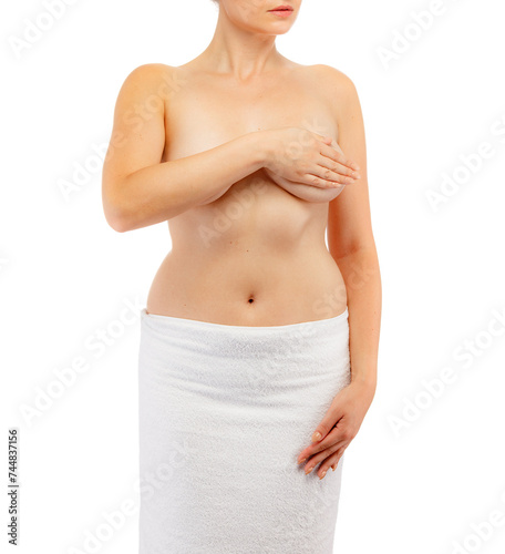 Woman examining her breast isolated on white background 