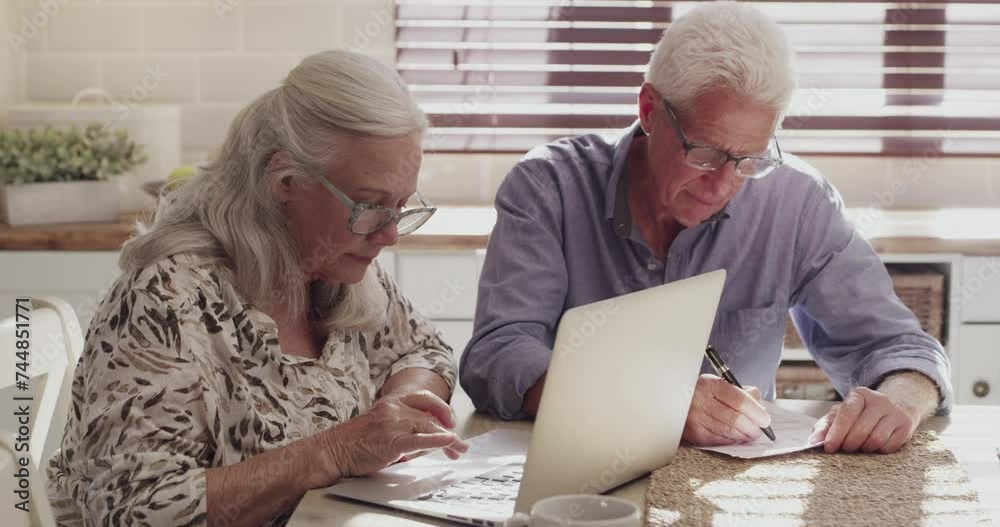 Senior couple, reading computer and home research for pension, retirement and budget or thinking of insurance. Elderly woman typing on laptop, planning and man writing on document of asset management Senior couple, reading computer and home research for pension, retirement and budget or thinking of insurance. Elderly woman typing on laptop, planning and man writing on document of asset management