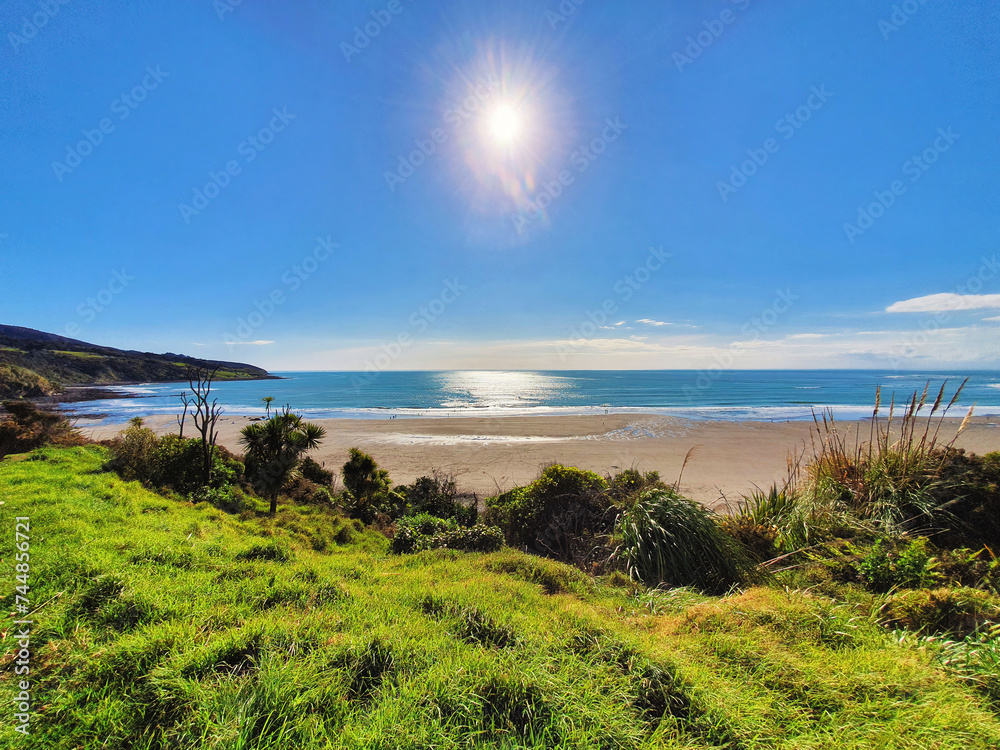 Experience the laid-back charm of Raglan Beach, renowned for its surfing, scenic beauty, and relaxed coastal atmosphere in New Zealand.