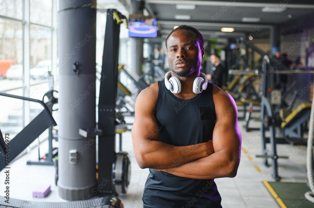 African american man standing on gym background