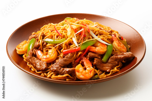 A plate of chow mein with vegetables and shrimp.