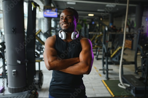 Young African-American man in a gym preparing to exercise