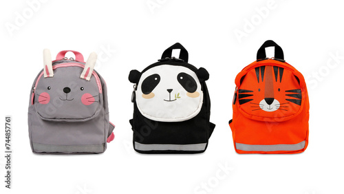 Front view closeup of colorful animal-shaped schoolbags isolated on white background. (ID: 744857761)