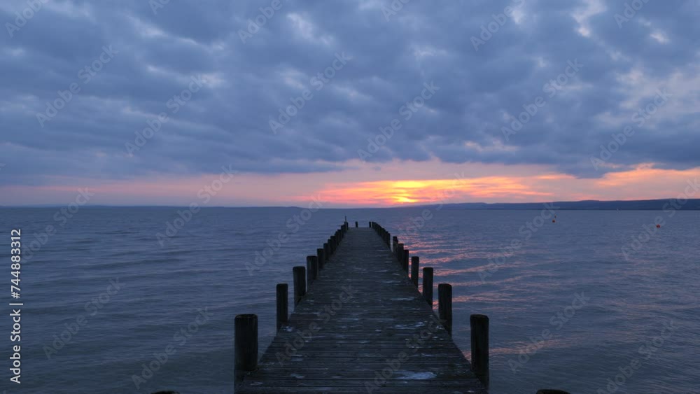 Wooden Pier at Sunset at a Lake Wooden Pier at Sunset at a Lake