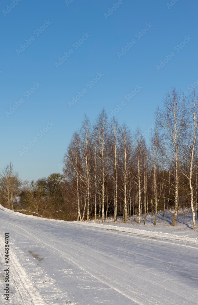 a slippery and dangerous road covered with snow and ice a slippery and dangerous road covered with snow and ice