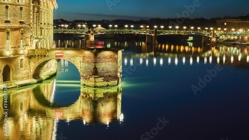 Remains of covered bridge of Daurade, built from 1141 to 1179 (still visible, since New Bridge) in Toulouse, France. Museum of History of Medicine. Museum is located in Hotel Assezat. photo