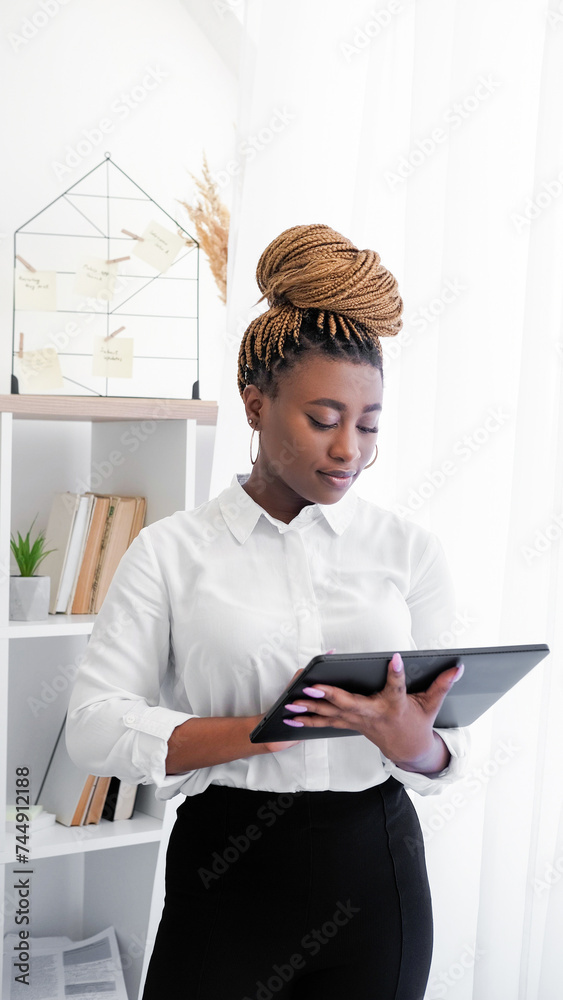 Tablet browsing online surfing confident woman