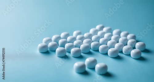  A collection of white spheres on a blue background