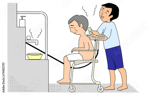 シャワーキャリーに座った高齢男性を男性介護職員が洗身している photo