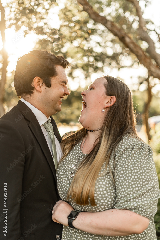 Laughing In Love Sage Green Formal Church Dressed Young Couple Engagement Christian Family Wedding Engagement Laughing In Love Sage Green Formal Church Dressed Young Couple Engagement Christian Family Wedding Engagement