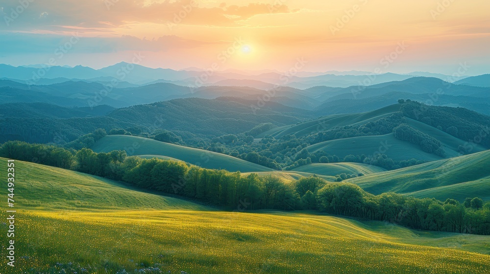 mountainous countryside at sunset. landscape with grassy rural fields and trees on hills rolling in to the distance in evening light. - obrazy, fototapety, plakaty 