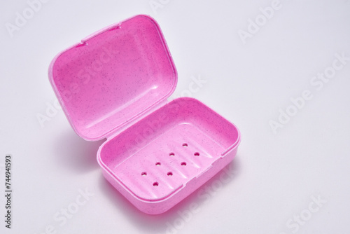 Photography purple plastic bath soap container isolated on white background