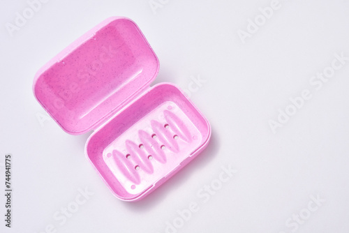 Photography purple plastic bath soap container isolated on white background