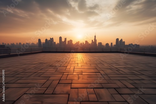 Empty floor platform with contemporary city skyline in the distance and a sunset view