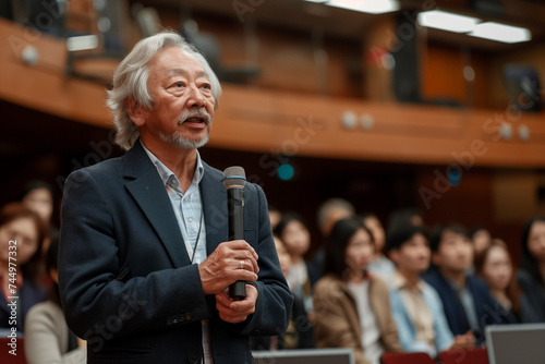 Senior asian male lecturer presenting