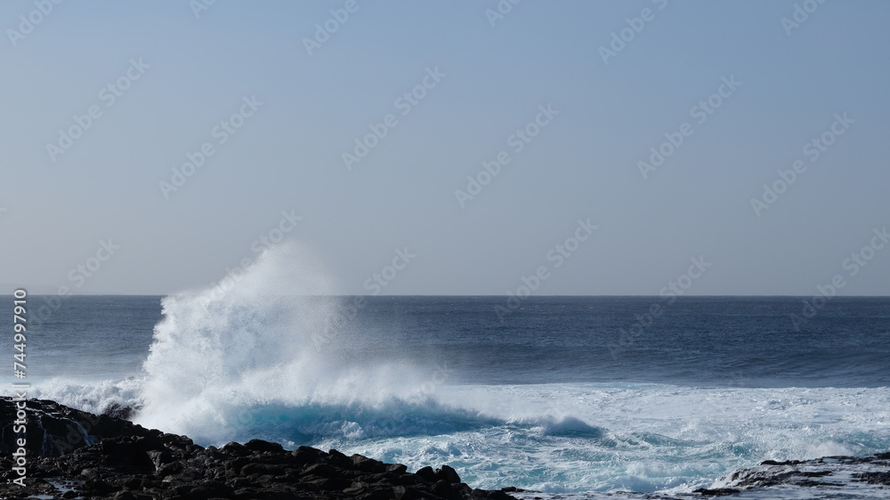 Large breaking waves and ocean view in Las Palmas, Canary islands, Spain Large breaking waves and ocean view in Las Palmas, Canary islands, Spain