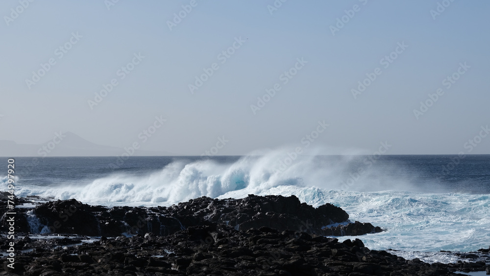 Large breaking waves and ocean view in Las Palmas, Canary islands, Spain Large breaking waves and ocean view in Las Palmas, Canary islands, Spain