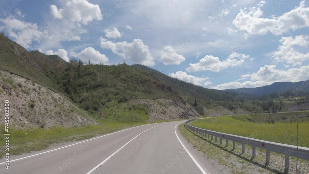 Video of driving in a car In summer season along the mountain road in Altai. Video of driving in a car In summer season along the mountain road in Altai.