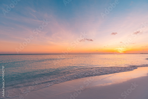 Summer nature sea sand sky  sunrise colors clouds  horizon  tranquil background banner. Inspirational nature landscape  beautiful colors  wonderful scenery tropical beach. Beach sunset vacation coast