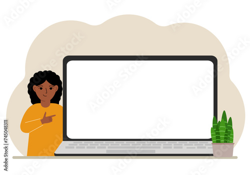 A small girl next to a large laptop with a lot of space for text.