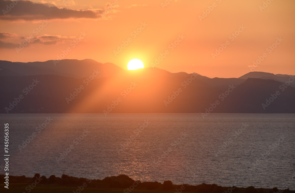 Fototapeta premium the sun sets behind the mountains in winter in Cyprus 12