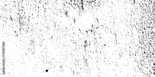 Dust overlay distress grungy effect paint. Black and white grunge seamless texture. Dust and scratches grain texture on white and black background.   © armans