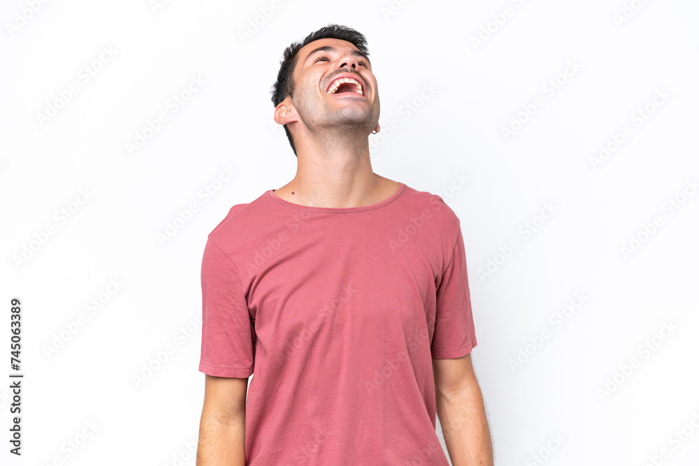 Young handsome man over isolated white background laughing Young handsome man over isolated white background laughing