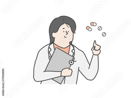薬の説明をする女性医師　薬剤師