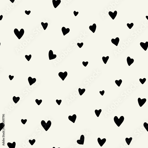 Vector seamless pattern. Monochrome simple hearts. Stylish hand made print. Abstract natural texture. Hand drawn abstract background. Can be used as swatch for illustrator.