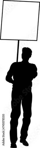 Protestor or demonstrator at a demonstration march, picket line or strike protest rally in silhouette. Holding up a banner or picket sign board placard.