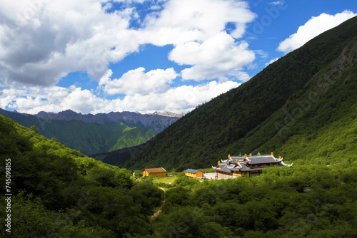 A Buddhist Temple Enveloped by Majestic Mountains
