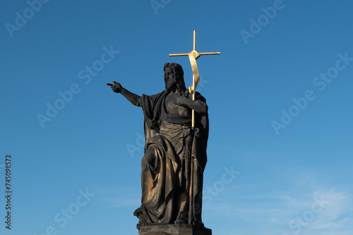  The Statue of St. John the Baptist, Charles Bridge in Prague, Czech Republic