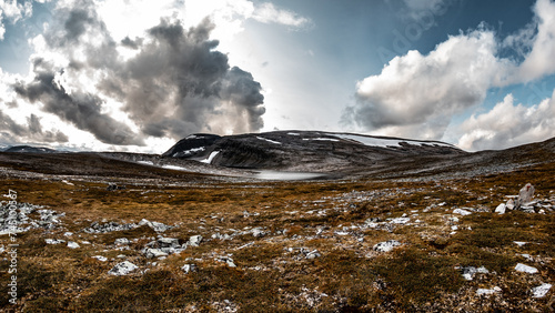 A orange mountain in Norway in the Trollheimen group. photo