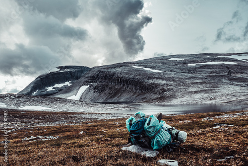 A backpack against the background of a beautiful mountain in Norway. photo