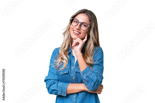 Young Uruguayan woman over isolated background happy and smiling photo