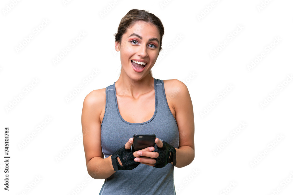 pretty Sport Uruguayan woman over isolated background surprised and sending a message pretty Sport Uruguayan woman over isolated background surprised and sending a message