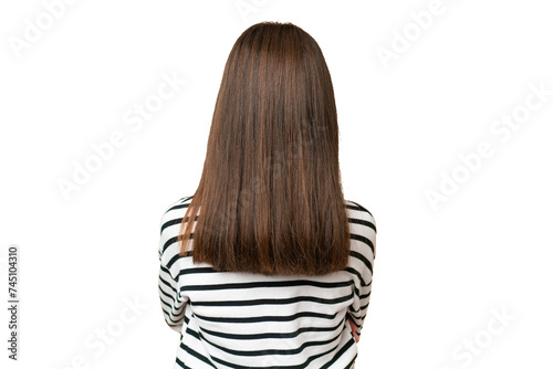 Little caucasian girl over isolated background in back position