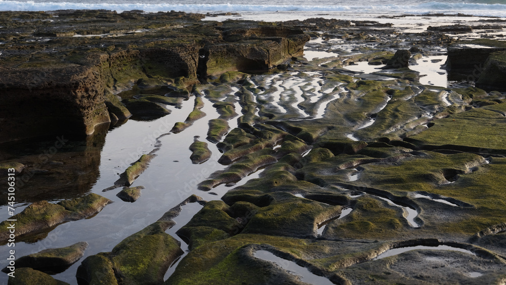 Erosion patterns in bedrock on shore in Canary islands, Spain