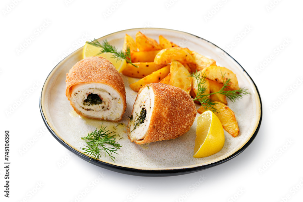 Chicken Kiev breast stuffed with butter, garlic and dill. Served with baked potato slices and fresh herbs. isolated on white background Chicken Kiev breast stuffed with butter, garlic and dill. Served with baked potato slices and fresh herbs. isolated on white background