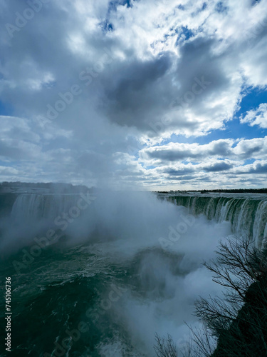 Niagara Falls, Ontario, Canada. Niagara Falls is the largest waterfall in the world. Beautiful view fro the ground near waterfall