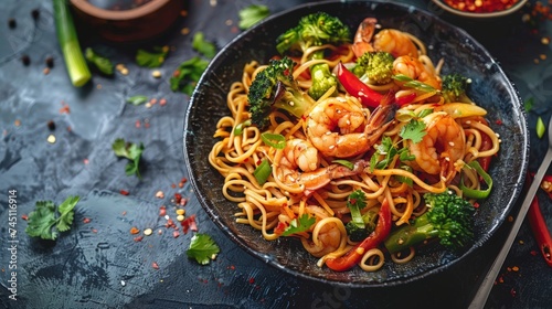 Stir fry noodles with vegetables and shrimps photo