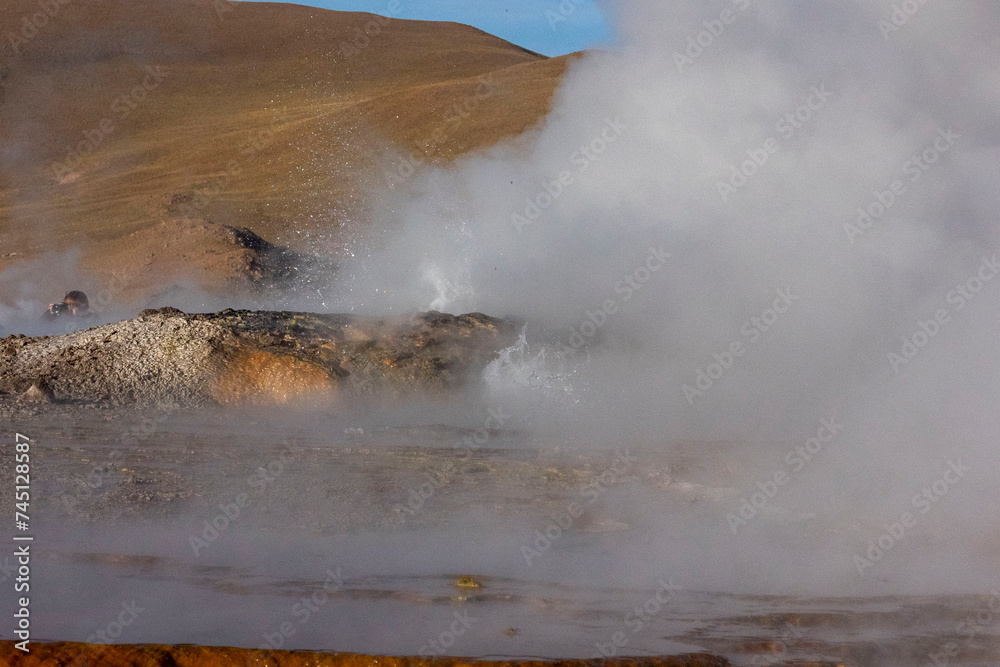 Tatio Geysers in San Pedro de Atacama, Chile, South America. Dramatic volcanic hot springs with rising water and steam