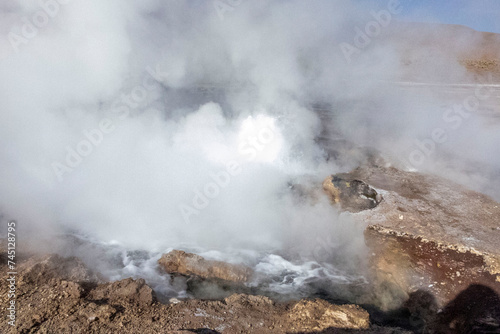 Tatio Geysers in San Pedro de Atacama, Chile, South America. Dramatic volcanic hot springs with rising water and steam