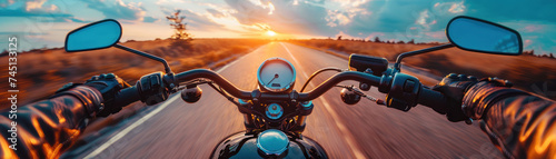 open road, the motorcyclist embraces the exhilarating freedom of the journey. With the powerful roar of the motorcycle engine and the wind rushing past photo