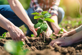 Earth-saving activities People help plant trees in the garden on Earth Day.