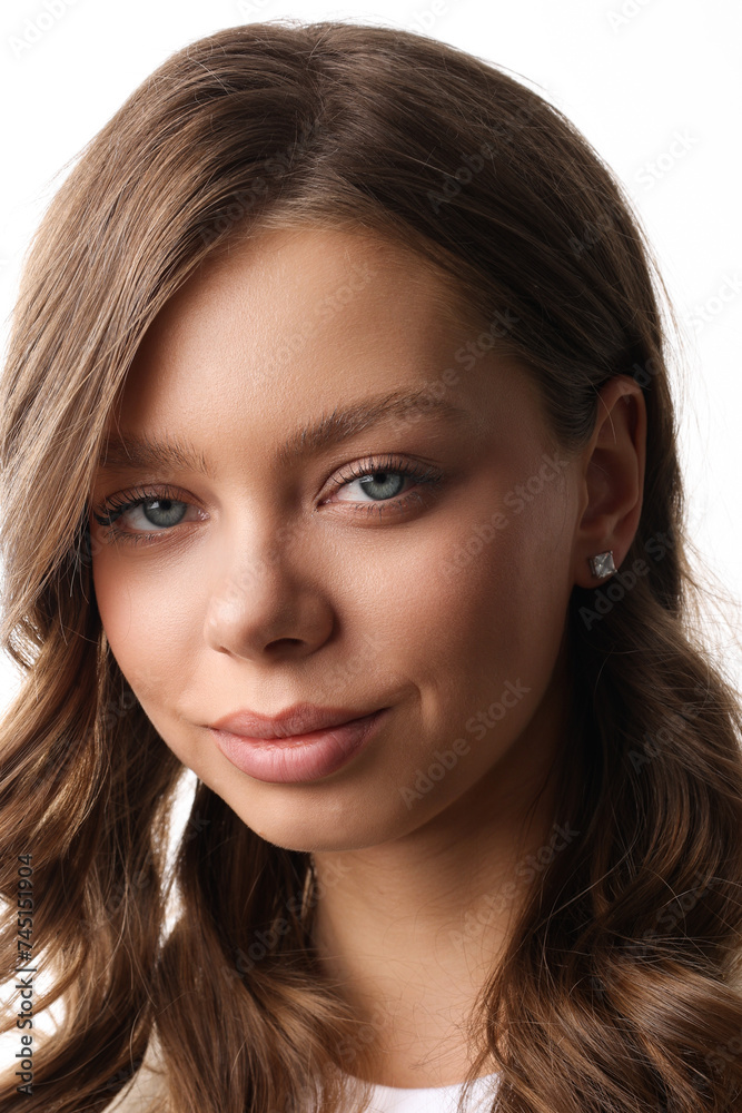 Beautiful young girl with fresh healthy skin. Woman advertise ear-rings. White background. Earrings closeup. Blond european woman with long hair with big lips, pretty smile. Cosmetology, scincare Beautiful young girl with fresh healthy skin. Woman advertise ear-rings. White background. Earrings closeup. Blond european woman with long hair with big lips, pretty smile. Cosmetology, scincare