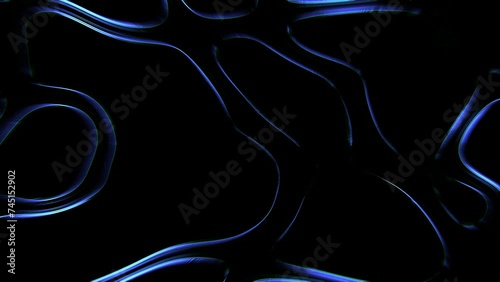 Black background with a blue line that is curved and has a wavy appearance.  photo