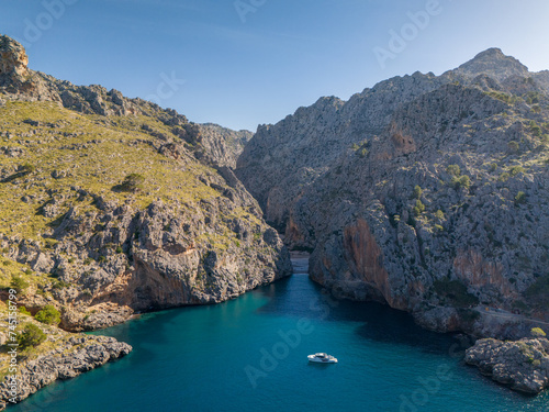 Beach Sa Colobra in Mallorca, aerial drone view from the sea side